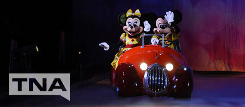 Mickey and Minnie Mouse in a car at Disney On Ice