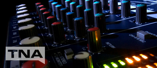 Close up of an electronic music DJ sound board