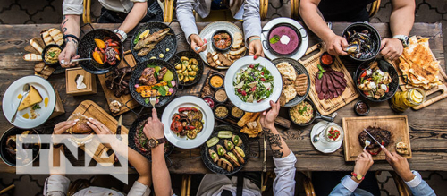 Friends feasting a food event or dinner party