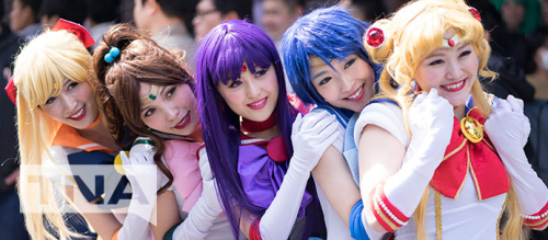 Sailor Moon cosplay group posing at pop culture convention